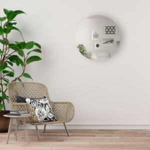 Plakspiegel rond verzilverd 70 cm, geplakt aan de woonkamer muur