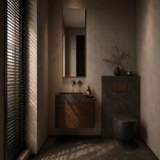 Rechthoekige toiletspiegel boven compact wastafelmeubel in een luxe gastentoilet.