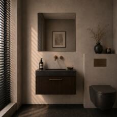 Vierkante toiletspiegel boven compact wastafelmeubel in een luxe gastentoilet.